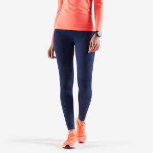 Legginsy do biegania damskie Kiprun Care. Niebieskie legginsy KIPRUN, bez wzorów, z materiału, z podwyższonym stanem, długie. Za 89,99 zł.
