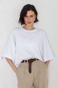 T-SHIRT LUNA BIAŁY L - Flawless. Białe t-shirty Flawless, l, bez wzorów, z bawełny, bez kołnierzyka, bez ramiączek. Za 259,00 zł.