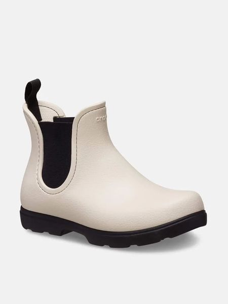 Crocs Sztyblety "Dylan" w kolorze kremowo-czarnym rozmiar: 37/38. Brązowe botki Crocs, bez wzorów, bez zapięcia. Za 188,95 zł.