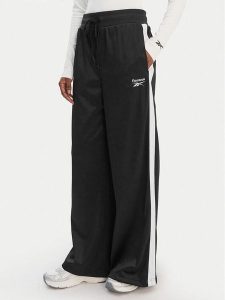 Reebok Spodnie dresowe Dianne RK25512CCW Czarny Relaxed Fit. Czarne spodnie dresowe Reebok, m, bez wzorów, z dresówki. Za 199,99 zł.