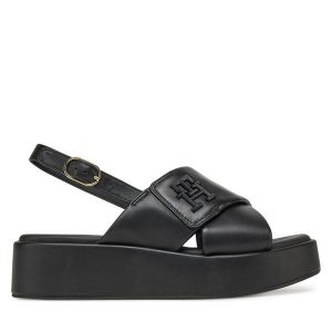 Sandały Tommy Hilfiger. Czarne sandały TOMMY HILFIGER, bez wzorów, bez obcasa, na koturnie, bez zapięcia. Za 369,99 zł.