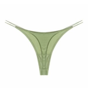 Stringi z cienkimi paseczkami z wysokiej jakości materiału Pauline. Żółte stringi Intica, bez wzorów, z materiału. W wyprzedaży za 69,00 zł.