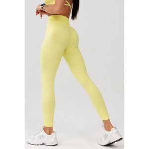 Damskie legginsy bezszwowe Rough Radical Seamless Glow Long. Żółte legginsy ROUGH RADICAL, bez wzorów. W wyprzedaży za 127,92 zł.