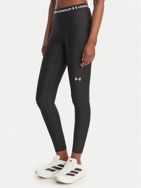 Under Armour Legginsy HeatGear® 6010002 Czarny Slim Fit. Czarne legginsy Under Armour, bez wzorów, z syntetyku. Za 189,99 zł.