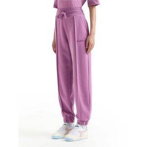 Spodnie dresowe damskie DIADORA L. PANT ATHL. LOGO. Fioletowe spodnie dresowe Diadora, l, bez wzorów, z dresówki. Za 99,99 zł.