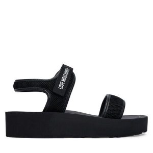 Sandały LOVE MOSCHINO. Czarne sandały LOVE MOSCHINO, bez wzorów, bez obcasa, na płaskiej podeszwie, bez zapięcia. Za 472,99 zł.