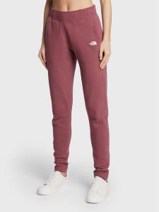 The North Face Spodnie dresowe W Nse NF0A55GS Bordowy Slim Fit. Czerwone spodnie dresowe The North Face, xs, bez wzorów, z bawełny. Za 169,99 zł.