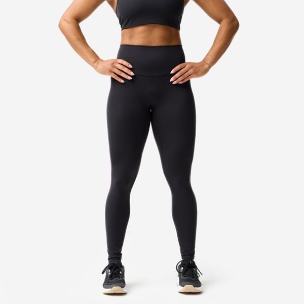 Legginsy fitness damskie Domyos. Czarne legginsy DOMYOS, bez wzorów, z elastanu. Za 129,99 zł.