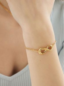 Guess Bransoletka JUBB05 050JW Złoty. Żółte bransoletki Guess, metalowe. Za 159,99 zł.