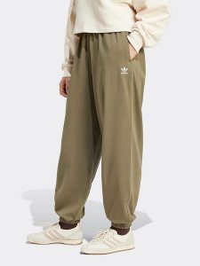 Adidas Spodnie dresowe w kolorze khaki rozmiar: M. Brązowe spodnie dresowe ADIDAS, m, bez wzorów, z bawełny. Za 140,53 zł.
