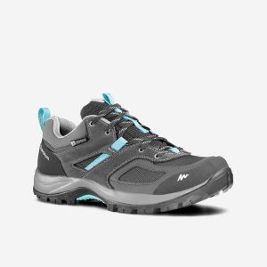 Buty turystyczne damskie Quechua MH100 niskie WTP. Niebieskie buty trekkingowe QUECHUA, z kauczuku, bez zapięcia. Za 229,99 zł.