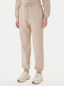 Guess Spodnie dresowe V5BB23 KCX22 Beżowy Regular Fit. Brązowe spodnie dresowe Guess, l, z aplikacjami, z dresówki. Za 479,99 zł.