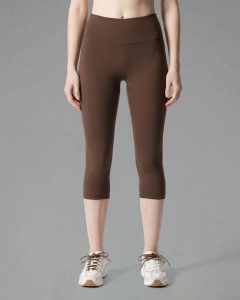 Legginsy 3/4 Softform™ - Brązowy. Brązowe legginsy JOY STUDIO, bez wzorów, z tkaniny, z podwyższonym stanem, długie. Za 203,00 zł.
