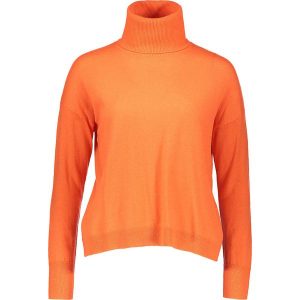 Golf w kolorze pomarańczowym. Brązowe golfy marki Benetton, z wełny. W wyprzedaży za 84,95 zł.