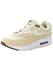 Nike Sportswear Skórzane sneakersy "Air Max 1 '87" w kolorze kremowo-beżowym rozmiar: 40. Brązowe trampki Nike Sportswear, bez wzorów, bez zapięcia. Za 549,06 zł.