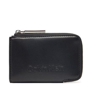 Portfel Calvin Klein. Czarne portfele Calvin Klein, bez wzorów. Za 139,99 zł.