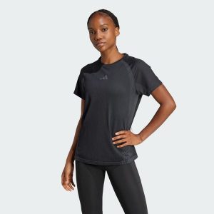 Bezszwowa koszulka z dzianiny. Czarne bluzki ADIDAS, bez wzorów, z dzianiny, sportowe, bez kołnierzyka, bez ramiączek. Za 199,00 zł.