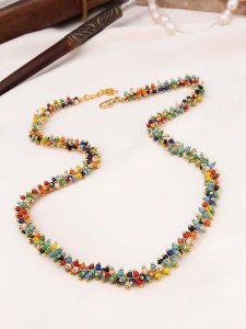 Pierres delicates Pozłacany naszyjnik z elementami ozdobnymi - dł. 45 cm rozmiar: onesize. Żółte naszyjniki Pierres delicates, z perłą, pozłacane. Za 43,99 zł.