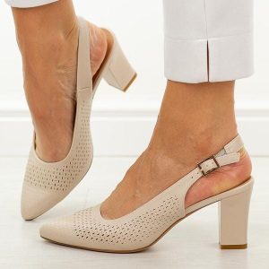 Cieliste czółenka damskie na słupku Sergio Leone Sk164. Czółenka Sergio Leone, w ażurowe wzory, z jeansu, bez obcasa, na słupku, bez zapięcia. Za 169,00 zł.