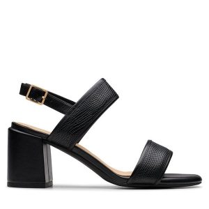 Sandały Clarks. Czarne sandały Clarks, bez wzorów, bez obcasa, na słupku, bez zapięcia. Za 219,99 zł.