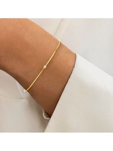 DIA DIAMONDS Pozłacana bransoletka z diamentem rozmiar: onesize. Żółte bransoletki DIA DIAMONDS, z diamentem, pozłacane. Za 167,28 zł.
