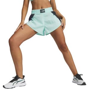 Spodenki Puma Fit Fashion Woven Flow Short, Kobiety. Niebieskie szorty Puma, bez wzorów, z poliesteru, sportowe. Za 290,00 zł.