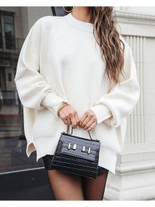 Milan Kiss Sweter w kolorze kremowym rozmiar: L. Brązowe swetry oversize Milan Kiss, l, bez wzorów, bez ramiączek. Za 165,99 zł.