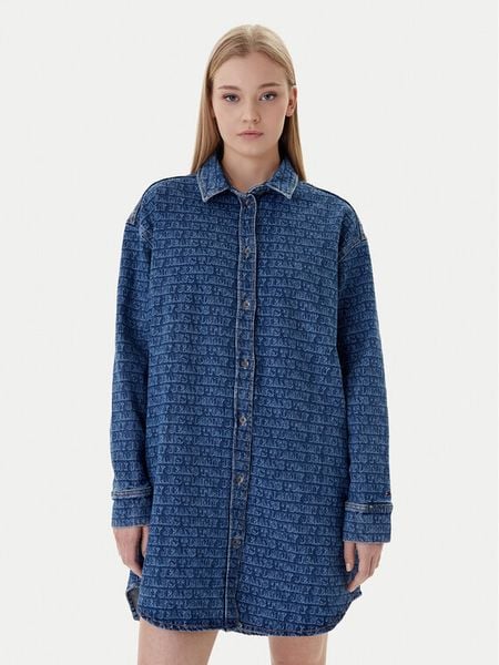 Tommy Jeans Sukienka jeansowa DW0DW22492 Niebieski Relaxed Fit. Niebieskie kombinezony Tommy Jeans, l, bez wzorów, z bawełny, bez kołnierzyka, bez ramiączek. Za 426,99 zł.