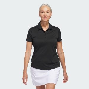 Koszulka polo Women's Solid Performance Short Sleeve. Czarne bluzki ADIDAS, s, bez wzorów, z materiału, klasyczne, bez kołnierzyka, bez ramiączek. Za 229,00 zł.