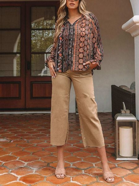 Milan Kiss Bluzka w kolorze czarno-karmelowym rozmiar: S. Czarne bluzki Milan Kiss, s, bez wzorów, bez kołnierzyka, bez ramiączek. Za 57,20 zł.