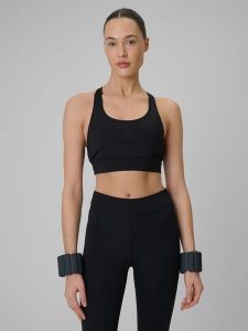 4F Biustonosz treningowy z niskim wsparciem damski - czarny XS. Czarne biustonosze sportowe 4f, bez wzorów, z gumy. Za 99,99 zł.