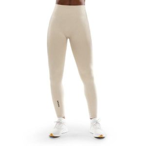 Damskie bezszwowe legginsy sportowe Fitness Siroko Fearless. Brązowe legginsy SIROKO, bez wzorów, z materiału, z podwyższonym stanem, długie. Za 126,00 zł.
