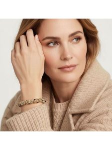 Otazu Pozłacana bransoletka z kryształami Swarovski rozmiar: onesize. Czarne bransoletki Otazu, z kryształem, pozłacane. Za 104,99 zł.