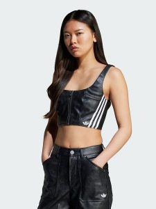 Adidas Top "Originals Adilenium Season 3" w kolorze czarnym ze skóry syntetycznej rozmiar: 34. Czarne topy ADIDAS, bez wzorów, ze skóry, bez kołnierzyka, bez ramiączek. Za 144,95 zł.
