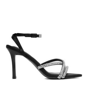 Sandały JENNY. Czarne sandały Jenny, bez wzorów, bez obcasa, na szpilce, bez zapięcia. Za 149,99 zł.