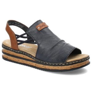 Granatowe Sandały Rieker Modne Obuwie Damskie. Niebieskie sandały Rieker, bez wzorów, ze skóry, bez obcasa, na koturnie, bez zapięcia. Za 319,00 zł.