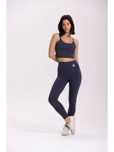 Onamaste Legginsy sportowe "Deb" w kolorze granatowym rozmiar: L/XL. Niebieskie legginsy Onamaste, bez wzorów, z materiału, z podwyższonym stanem. Za 144,92 zł.