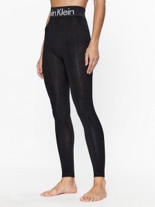 Calvin Klein Legginsy 701226027 Czarny Slim Fit. Czarne legginsy Calvin Klein, bez wzorów, z syntetyku. Za 79,99 zł.