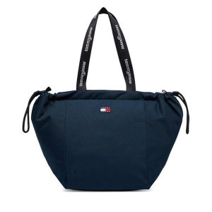 Torebka Tommy Jeans. Niebieskie torebki klasyczne Tommy Jeans, bez wzorów, z jeansu, bez dodatków. Za 329,99 zł.