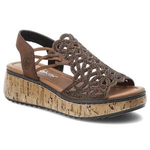 Sandały damskie Rieker, cholewka ze skóry ekologicznej ażurowa konstrukcja ozdobne zdobienia z drobnymi nitami, brązowe, V1765-24. Brązowe sandały Rieker, z aplikacjami, ze skóry ekologicznej, bez obcasa, na koturnie, bez zapięcia. Za 349,00 zł.
