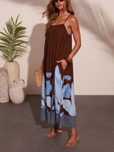 Milan Kiss Sukienka w kolorze brązowo-błękitnym rozmiar: XL. Brązowe sukienki Milan Kiss, xl, bez wzorów, bez kołnierzyka, bez ramiączek, maxi. Za 329,95 zł.