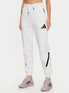Adidas Spodnie dresowe Z.N.E. JE7843 Biały Regular Fit. Białe spodnie dresowe ADIDAS, xl, bez wzorów, z bawełny. Za 279,99 zł.