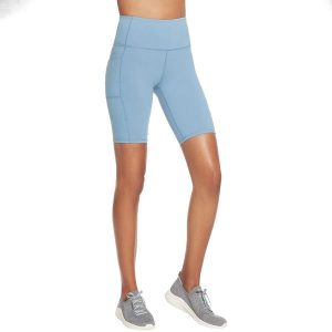 Spodenki sportowe damskie Skechers Go Walk High Waisted Bike Short. Niebieskie spodenki sportowe Skechers, s, bez wzorów, z elastanu, na fitness i siłownię. Za 139,99 zł.