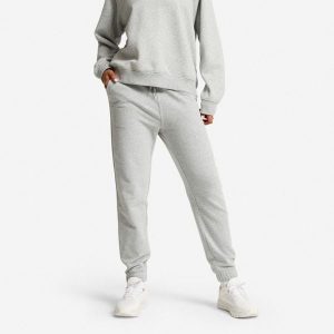 Spodnie dresowe damskie Domyos Gym & Pilates. Szare spodnie dresowe DOMYOS, s, bez wzorów, z bawełny. Za 89,99 zł.