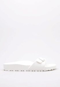 Klapki damskie Birkenstock Eva Madrid. Białe klapki Birkenstock, bez wzorów, z materiału, bez obcasa. Za 275,00 zł.