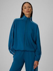 4F Bluza dresowa loose bez kaptura damska - turkusowa L. Niebieskie bluzy 4f, l, bez wzorów, z dresówki, bez kaptura. Za 179,99 zł.