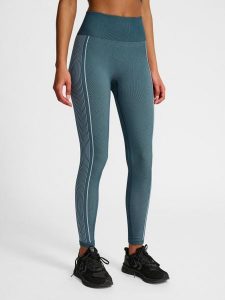 Damskie legginsy bezszwowe Hummel. Brązowe legginsy Hummel, bez wzorów, z materiału, długie. Za 178,10 zł.