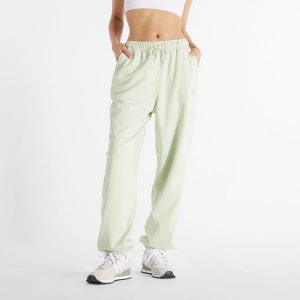 Spodnie damskie New Balance WP41513NUM – miętowe. Zielone spodnie z wysokim stanem New Balance, bez wzorów, z bawełny, z podwyższonym stanem. Za 169,99 zł.