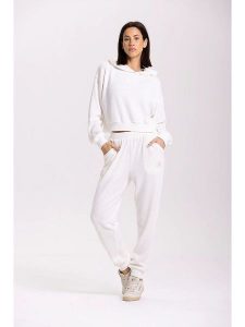 Onamaste Spodnie dresowe "Mika" w kolorze kremowym rozmiar: L/XL. Brązowe spodnie dresowe Onamaste, l, bez wzorów, z dresówki. Za 187,45 zł.