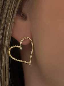 ÔNESSA Kolczyki-wkrętki rozmiar: onesize. Żółte kolczyki ÔNESSA, z mosiądzu. Za 92,21 zł.